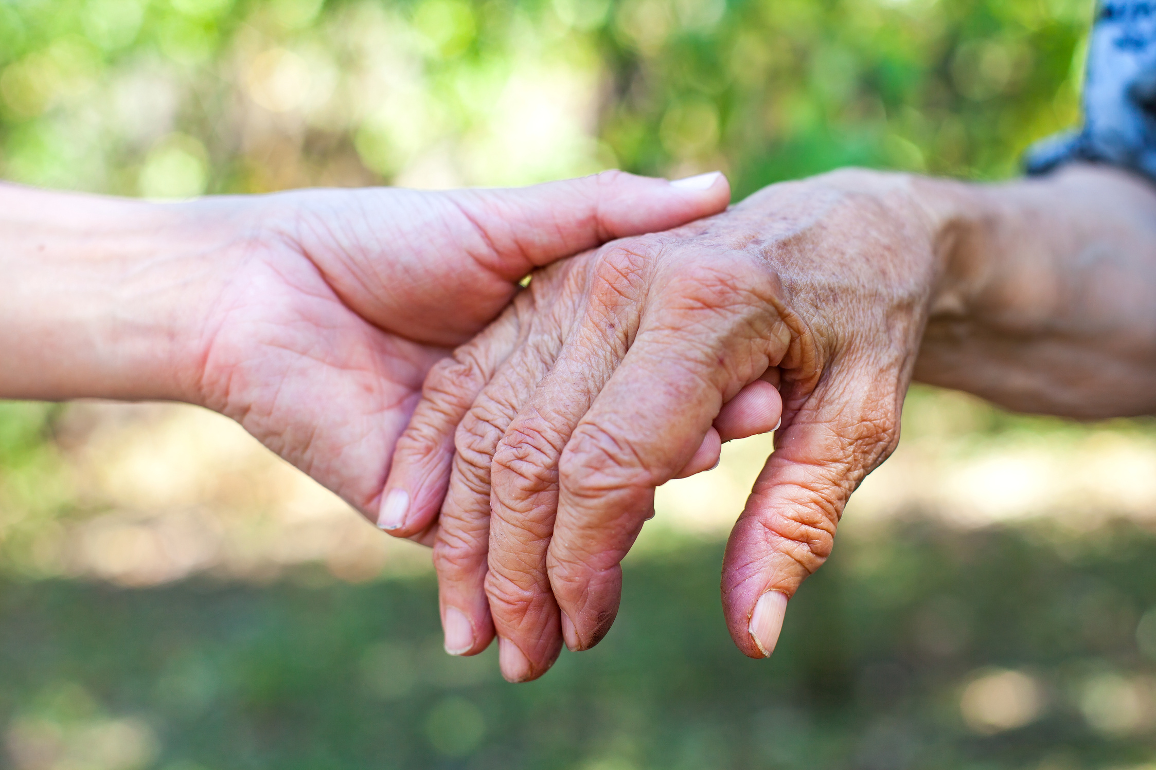 Shaking elderly hand
